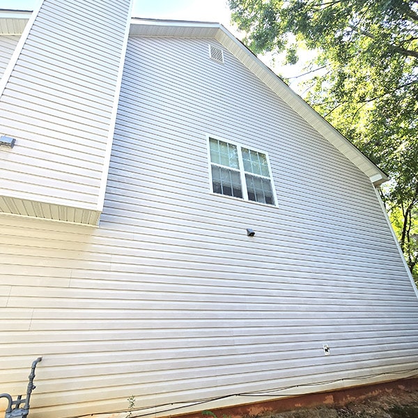 Vinyl siding with mildew before soft wash