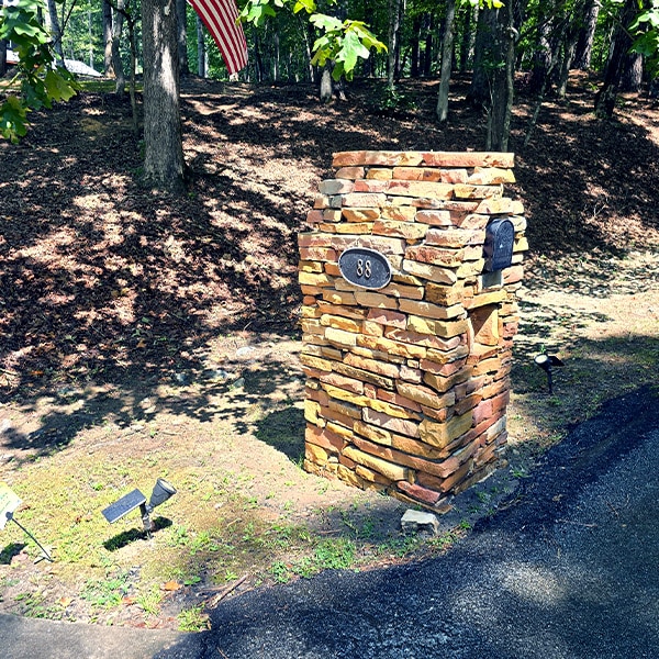 Stone mailbox column clean after pressure washing